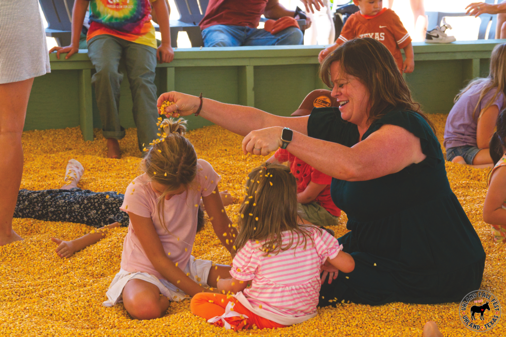 Family fun in the corn pit at Uhland Fall Fest